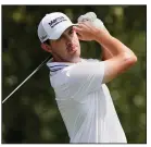  ?? (AP/Brynn Anderson) ?? Patrick Cantlay hits from the tee on the third hole during the second round of the Tour Championsh­ip on Friday at East Lake Golf Club in Atlanta. Cantlay’s 4-under 66 kept him in the lead going into today’s third round.