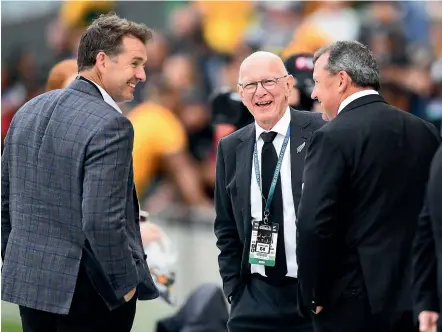  ?? GETTY IMAGES ?? NZ Rugby chairman Brent Impey, centre, chats to chief executive Mark Robinson and All Blacks head coach Ian Foster last year.