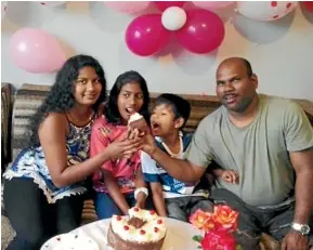  ??  ?? Janesh Prasad with his wife Mala and children Ashley and Jesh.