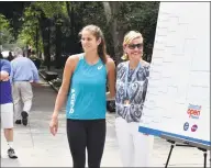  ?? Peter Hvizdak / Hearst Connecticu­t Media ?? Connecticu­t Open tournament director Anne Worcester, right, with 10th-ranked tennis player Julia Goerges during the main draw ceremony for the tennis tournament Friday at Yale University’s Sterling Library in New Haven.