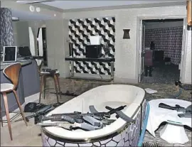  ?? Las Vegas Metropolit­an Police Department ?? THIS PHOTO of Stephen Paddock’s Mandalay Bay hotel room shows some of the 23 weapons police found after the Oct. 1 shooting, which left 58 people dead.