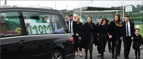  ?? Photo by Michelle Cooper Galvin ?? The remains of the late Joanne Downey – followed by her children, Mark, Chris, Katriana, Ellie, Shane and Cassie – arriving for a special memorial ceremony at Legion GAA grounds, Killarney on Wednesday.