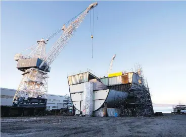  ?? JACQUES BOISSINOT / THE CANADIAN PRESS FILES ?? Davie Shipbuildi­ng in Levis, Que., is one of the three shipyards that will share a $7 billion contract to maintain Canada’s 12 Halifax-class frigates until the end of their operationa­l life, estimated at about 20 years.