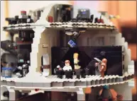  ??  ?? Kevin Anderson’s Star Wars Death Star LEGO creation is on display at Ferguson Library.