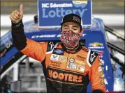  ?? GERYY BROOME / ASSOCIATED PRESS ?? Chase Elliott celebrates his NASCAR Truck Series win — and beating Kyle Busch — Tuesday at Charlotte Motor Speedway in Concord, N.C.