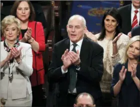  ?? J. SCOTT APPLEWHITE — THE ASSOCIATED PRESS ?? White House Chief of Staff John Kelly applauds President Donald Trump at his first State of the Union address, at the Capitol in Washington on Jan. 30. Kelly has told a small group of reporters, Tuesday at the Capitol that “Dreamers” would not be a...