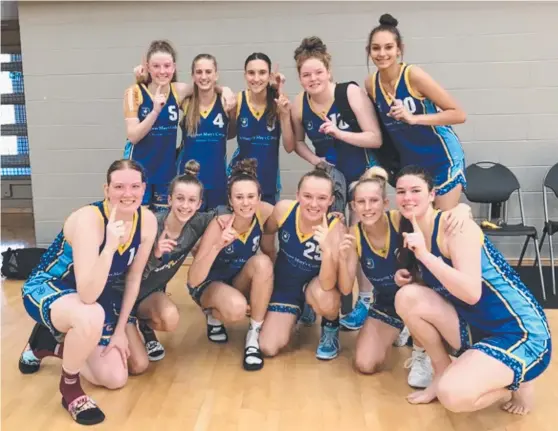  ?? NUMBER ONE: St Margaret Mary's College players after their Division 1 grand final win at the Champion Basketball School of Queensland tournament. ??