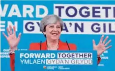  ??  ?? GRESFORD: Britain’s Prime Minister Theresa May speaks during a launch event for the Welsh Conservati­ve general election manifesto at Gresford Memorial Hall in the village of Gresford, near Wrexham, North Wales. —AFP