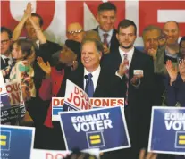  ?? JOHN BAZEMORE/ASSOCIATED PRESS FILE PHOTO ?? Democrat Doug Jones speaks Dec. 12 in Birmingham, Ala. Roy Moore went to court to try to stop Alabama from certifying Jones as the winner of the U.S. Senate race, but a judge denied his request.