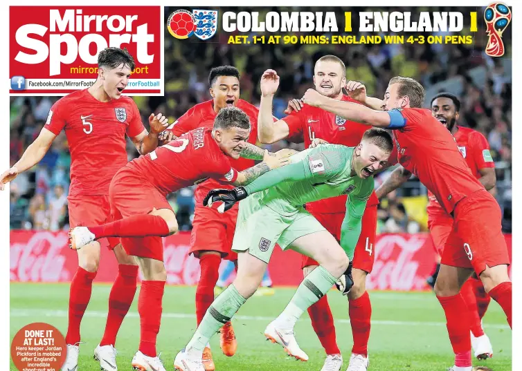  ??  ?? DONE IT AT LAST! Hero keeper Jordan Pickford is mobbed after England’s incredible shoot-out win