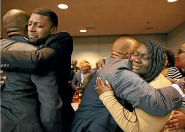  ?? AP ?? Odell Edwards, second left, and Charmaine Edwards, parents of slain teenager Jordan Edwards, react to a guilty of murder verdict at the trial of former police officer Roy Oliver at the Frank Crowley Courts Building in Dallas yesterday.