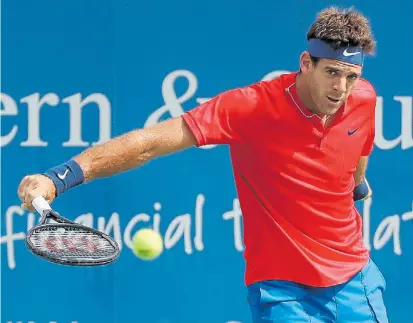  ?? AP ?? Otro revés. Del Potro y un revés con slice durante su partido con Dimitrov. El argentino no despega.