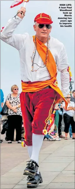  ??  ?? HIGH LIFE: A lean Paul Woodhead took up Morris dancing two years ago to improve his health