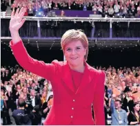  ??  ?? Setting out her stall First Minister and SNP leader Nicola Sturgeon waves to the crowd at the SNP annual conference