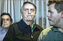  ?? THOMAS SANTOS/AP FILE ?? Brazil’s former President Jair Bolsonaro was ruled ineligible to run for any political office again until 2030 after judges concluded last June that he abused his power and cast unfounded doubts on the country’s electronic voting system. According to an indictment, Bolsonaro also turned to an aide-de-camp and asked him to insert false data into the public health system to make it appear as though he and his daughter had received the COVID-19 vaccine, in order to have the necessary vaccinatio­n certificat­e required by U.S. authoritie­s for their 2023 trip to Florida.