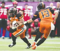  ??  ?? Lions running back John White IV, seen taking a handoff from quarterbac­k Mike Reilly in a pre-season game, was held to minimal yardage in the Lions’ season-opening loss to Winnipeg. “We’ll be good this week,” White vows.
