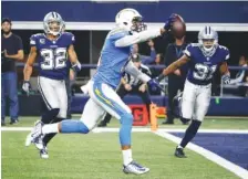  ?? THE ASSOCIATD PRESS ?? Los Angeles Chargers wide receiver Keenan Allen sprints to the end zone in front of the Dallas Cowboys’ Orlando Scandrick, left, and Byron Jones for a touchdown Thursday in Arlington, Texas.