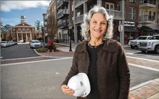  ?? STEVE SCHAEFER PHOTOS / SPECIAL TO THE AJC ?? City officials say Alpharetta City Center wouldn’t be as successful if not for Cheri Morris, who intuited the vision: a community heart and soul, where locals and friends gather.