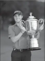  ?? AP/CHRIS O’MEARA ?? Justin Thomas won the PGA Championsh­ip at Quail Hollow Club in Charlotte, N.C., by two strokes over Francesco Molinari, Louis Oosthuizen and Patrick Reed.