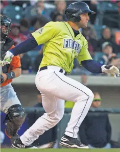  ?? JOSHUA S. KELLY, USA TODAY SPORTS ?? Playing as an outfielder for the Columbia ( S. C.) Fireflies, former NFL quarterbac­k Tim Tebow batted .216 with three home runs and 24 RBI in 64 games.