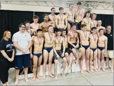  ?? KEV HUNTER — MEDIANEWS GROUP ?? The North Penn boys swimming team celebrates its District 1-3A title.