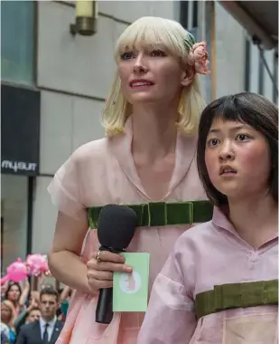  ??  ?? Tilda Swinton as Lucy Mirando, left, and Seo-Hyun Ahn as Mija in a scene from