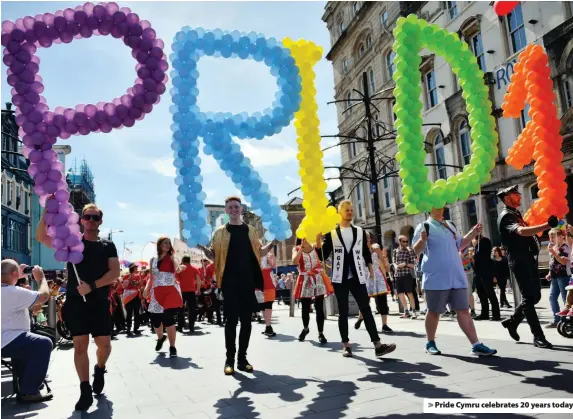  ??  ?? > Pride Cymru celebrates 20 years today