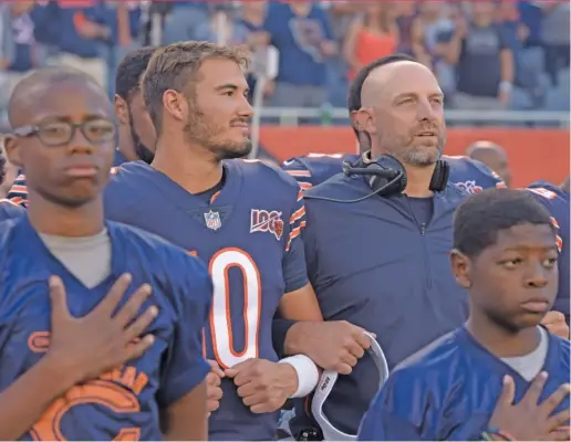  ?? AP ?? Mitch Trubisky ( center) was benched during the third game of the season, but he appears to give coach Matt Nagy and the Bears the best chance to win going forward.