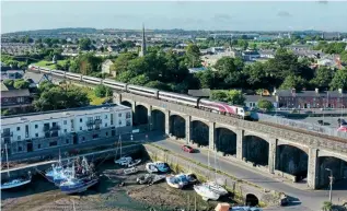  ?? FINBAR O’NEILL ?? IE’s 201 Class No. 227 crosses the viaduct at Balbriggan working the 07.35 Connolly-Belfast Enterprise service on July 14. The service is Ireland’s only named service and has been operating for 75 years.