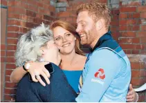  ??  ?? Family matters: Jonny Bairstow embraces his mum, Janet, and sister, Becky after the final