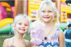  ??  ?? ALL SMILES: Maliyah Lee, 4, and Tirriana Lee, 6 at last year’s fair.