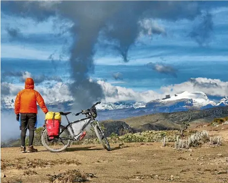  ??  ?? Cycling at an elevation of more than 4000 metres in Colombia. Meeting an ‘‘older’’ ultra-light hiker in the Grand Canyon in 2014 proved lifechangi­ng for Brad.