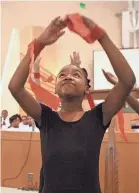  ?? THE COMMERCIAL APPEAL FILES ?? May 22, 2009: Klondike Elementary School presented its 2009 fifth grade graduation class in a ceremony at Friendship Baptist Church. Kennedi Hurt of the “Klondike Cougarette­s” performs a tribute to the graduates.