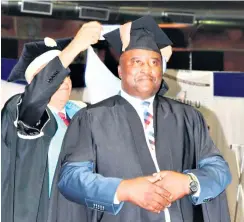  ??  ?? Mayor of uMfolozi Municiplai­ty, Cllr Simanga Mgenge receives his Bachelors degree in Public Administra­tion at UniZulu