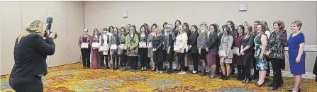  ?? BOB TYMCZYSZYN THE ST. CATHARINES STANDARD ?? Finalists set up for a group photo before the start of the 18th annual Women in Business Awards at the Marriott on the Falls.