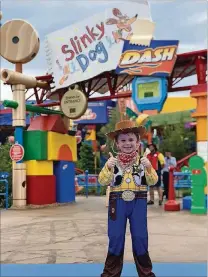  ?? PHOTO BY KATE TUCKWOOD-TAYLOR ?? Thumbs up from Sheriff Woody:Jack Crowley Edwards, 5, of Palm Beach Gardens, gets ready to ride the Slinky Dog Dash at Toy Story Land at Disney’s Hollywood Studios.