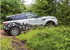  ?? Foto: Jaguar/Land Rover ?? Geländesca­nner: Das Versuchsfa­hrzeug von Land Rover tastet den Boden mit Senso ren im Bereich bis zu fünf Meter vor dem Auto ab.