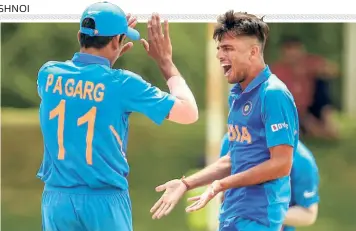  ?? PTI ?? Superb show: Ravi Bishnoi (right) of India celebrates after taking a wicket in the ICC U19 World Cup in February.