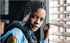  ?? ALAN MARKFIELD/AP ?? Naomie Harris plays a young police officer on the run from crooked colleagues in “Black and Blue.”