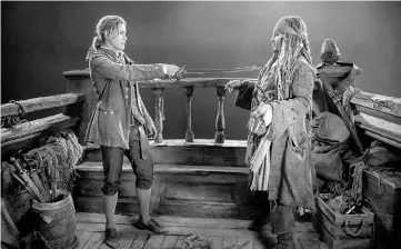  ??  ?? Thwaites (Henry) and Depp (Captain Jack Sparrow) in ‘Pirates of the Caribbean: Dead Men Tell No Tales’. — Courtesy of Walt Disney Studios