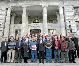  ?? PHOTO: FAIRFAX NZ ?? The Kiwi Scout contingent who attended the 9th World Jamboree in 1957 reunite at Parliament yesterday.