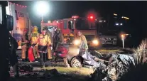  ?? PHOTO: STEPHEN JAQUIERY ?? The scene where two people died after a car and a truck collided between East Taieri and Allanton early yesterday.