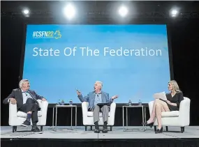  ?? SEAN KILPATRICK THE CANADIAN PRESS ?? Mike Harris, left, and Preston Manning take part in a panel discussion during the Canada Strong and Free conference in Ottawa on Friday.