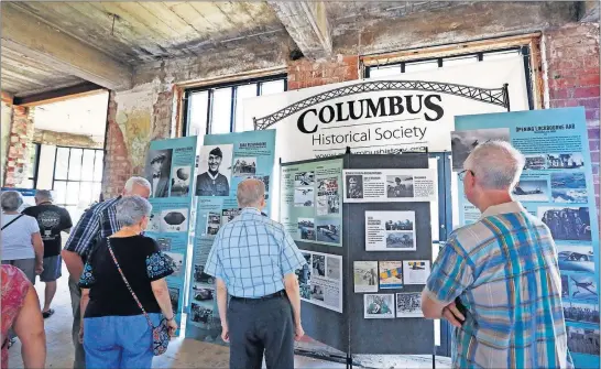  ?? [FRED SQUILLANTE/DISPATCH] ?? A Columbus Historical Society display in the original Port Columbus terminal informs Saturday’s visitors of local aviation history. Those working to preserve the building and possibly turn it into a state air and space museum welcomed the public for a day to mark its 90th anniversar­y and promote their cause.