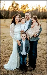  ?? (Special to the Democrat-Gazette) ?? Ashley and Cody Ruffin renewed their vows on Jan. 16, 2021, in celebratio­n of how their marriage had grown over the past 10 years. They were surrounded by friends and family, including their children — Eason, 8, Leila, 6 and Davis, 5.