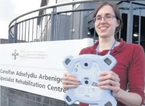  ??  ?? > Zoe Hadley, with the 3D camera, is part of ABMU’s Pressure Ulcer Prevention and Interventi­on Service (PUPIS)