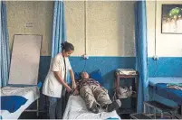  ??  ?? Man Bahadur Thapa, who was a security guard when he was hurt in a 2016 suicide bombing at the Canadian Embassy in Kabul, is treated in Kathmandu, Nepal.