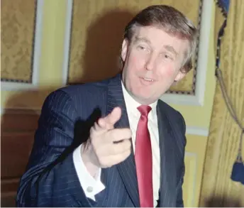  ?? TIMOTHY A. CLARY/AFP VIA GETTY IMAGES ?? Donald Trump answers questions about his divorce from then-wife Ivana in 1990.