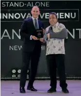  ?? ?? Manish Mehrotra receives the award for Indian Accent, the winner in Most Innvative Menu category.