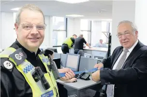  ??  ?? ●● Chief Constable Simon Byrne and Cheshire Police and Crime Commission­er John Dwyer officially open the Brunswick Street building